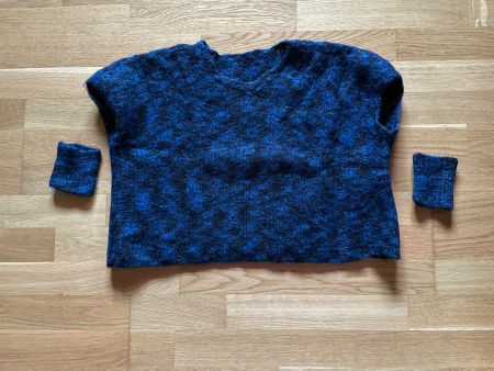 Woll-Pullunder, blau-schwarz meliert, mit Pulswärmern