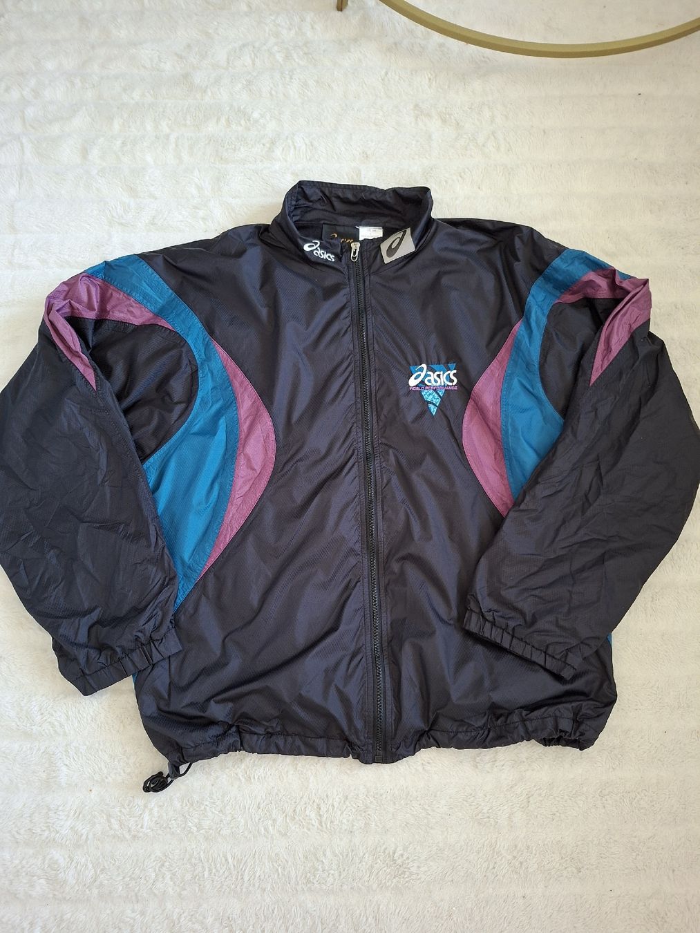 Asics Jacken: Veste Asics taille L multicolore  – Gebraucht aus Renens VD von ser_j2fn