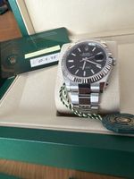 Neuwertige Rolex Datejust 41 schwarz 2025
