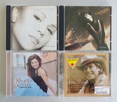 12 CD M.Carey, S.Twain, J.Denver, Zucchero, N.Diamond, ...