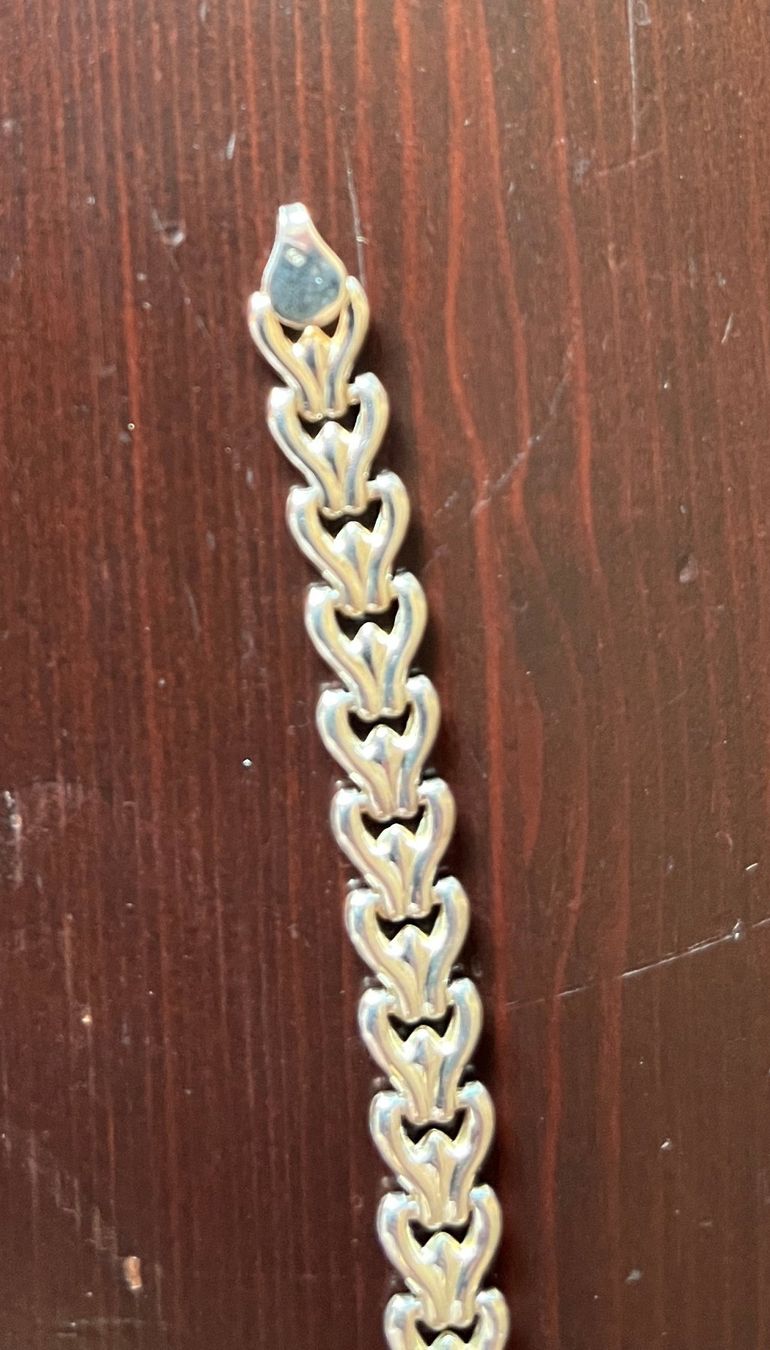 Bracelets: Bracelet en argent décorée en suite de coeurs – D'occasion à Genève par Donnet2 4