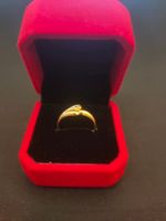 Ring mit kleinen Diamanten in 750 Gold / 18 Karat