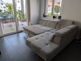 Ecksofa mit Schlaffunktion und Stauraum