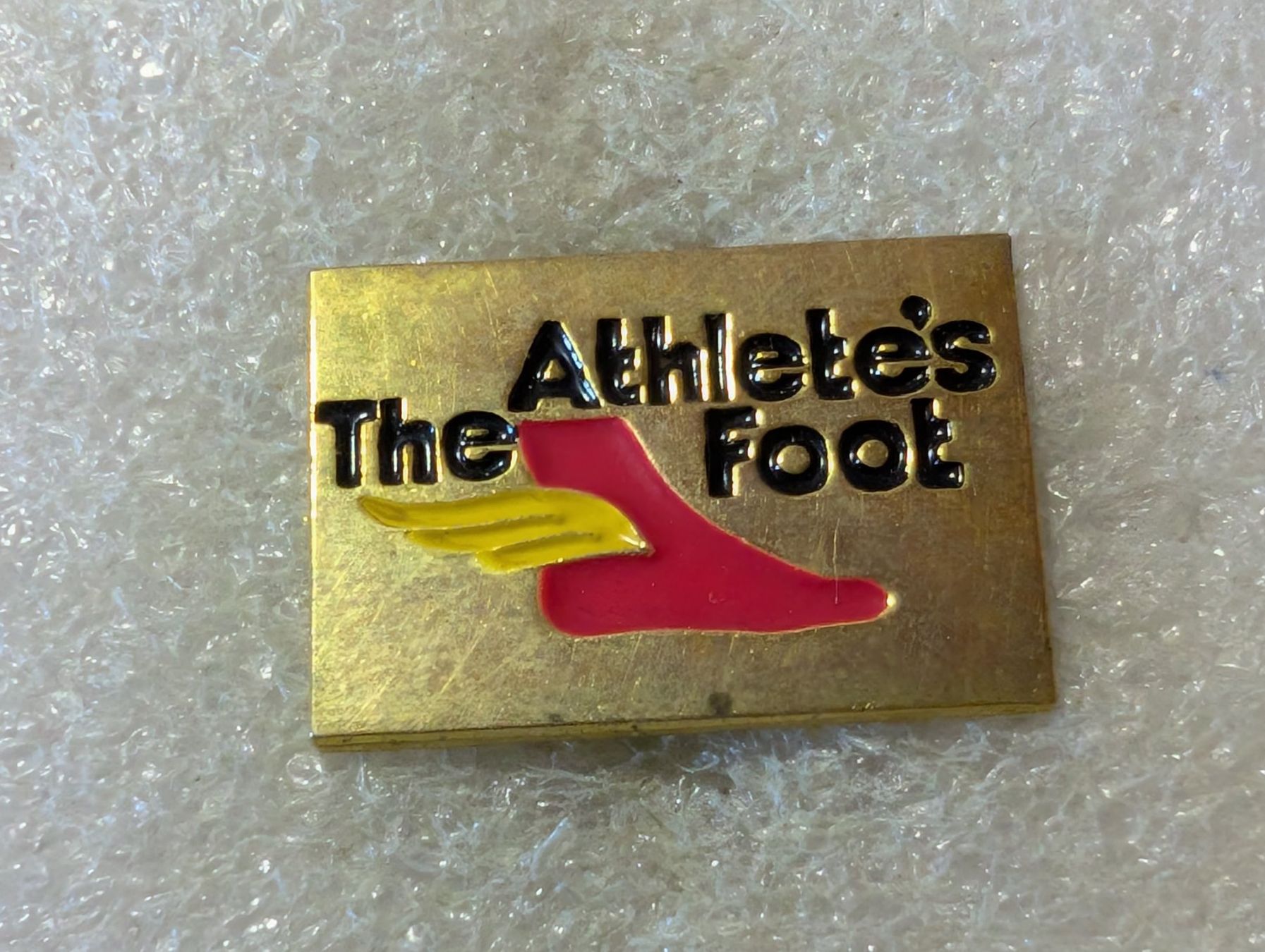 Placchette & Badge: Ansteckpin 172: The Athlete's Foot – Usato da Oppligen venduto da Pin-Fall-Shop