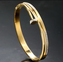 Gold Armreif Damen Edelstahl Zirkonia Nagel Neuwertig Elegan
