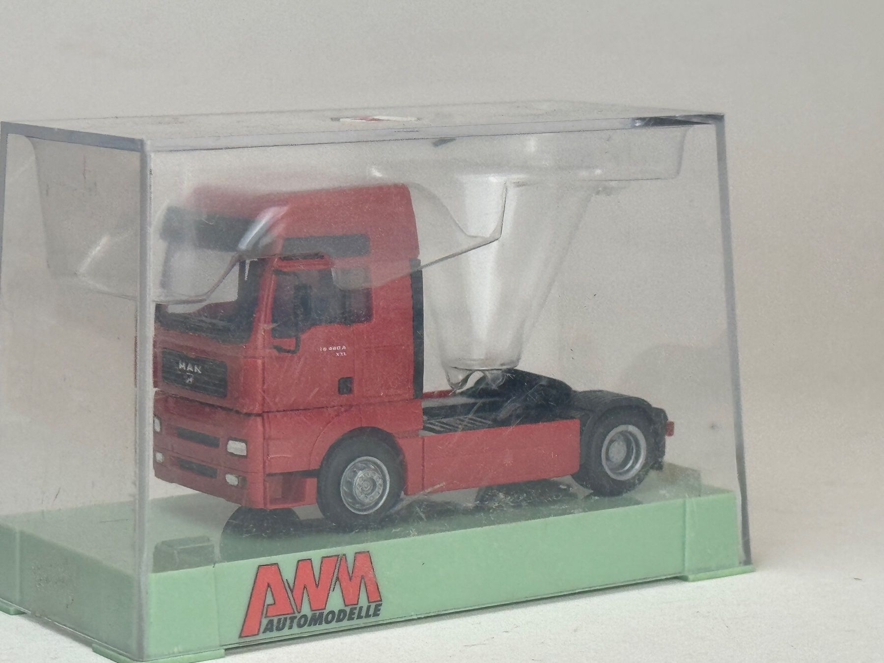Modellini d'auto: GB- AMW MAN Zugmaschine rot – Usato da Elm venduto da Wikmtz
