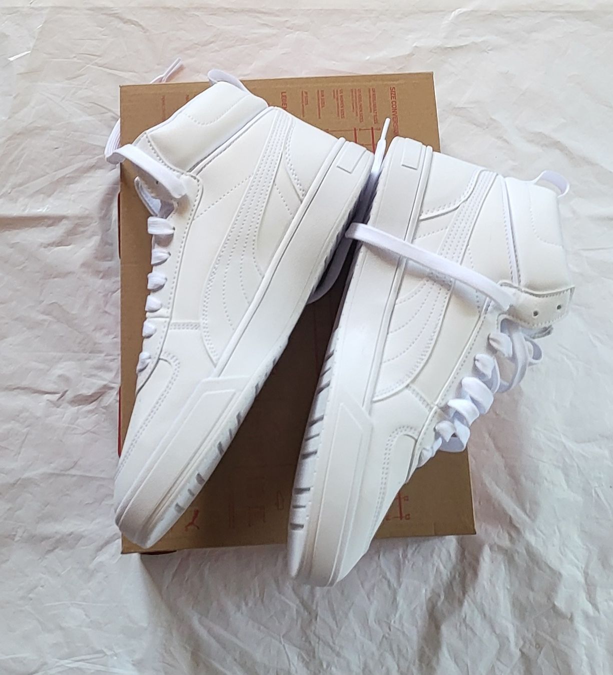 Puma Scarpe da uomo: Puma Caven Mid, blanches, taille 42.5, état  neuf – Nuovo (secondo la descrizione) da Niedergösgen venduto da Eva2410 7
