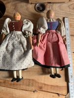 2 alte Holzpuppen