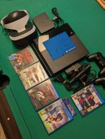 PS4 Konsole mit VR-Brille und div. Spiele
