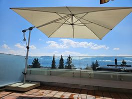 Glatz Sonnenschirm Sunnwing C+ mit Rollen Sockel