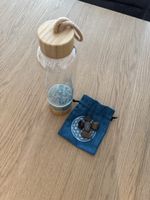 Glasflasche mit Heilsteinen, neuwertig