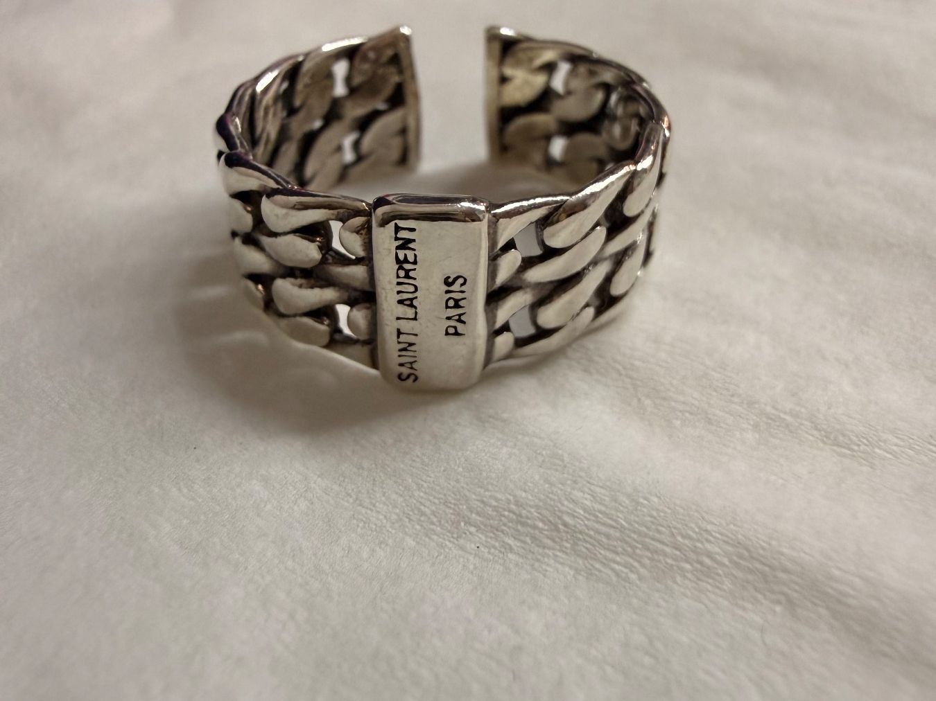 Saint Laurent Anelli: Saint Laurent Paris Ring Silber – Usato da Biberist venduto da jaquesgaraboto