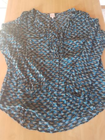 Chemise taille 42 marque Miss Captain