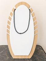 Collier perles hématite noires – style minimaliste et élégan