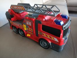 Camion de pompier jouet rouge échelle rétractable bon état
