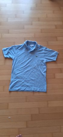 Polo Lacoste bleu clair taille FR 3 / US très bon état