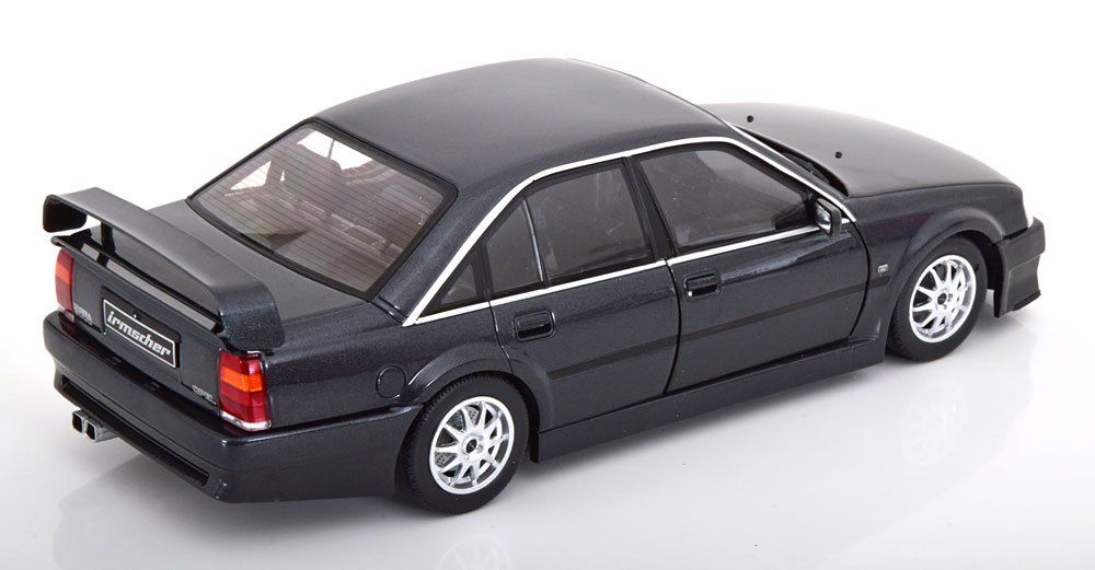 Opel Modellini d'auto: Opel Omega Evolution 500 1991-1992 dunkelgrau met.      1:18 – Nuovo e nell'imballaggio originale da Gerlafingen venduto da espero88 1