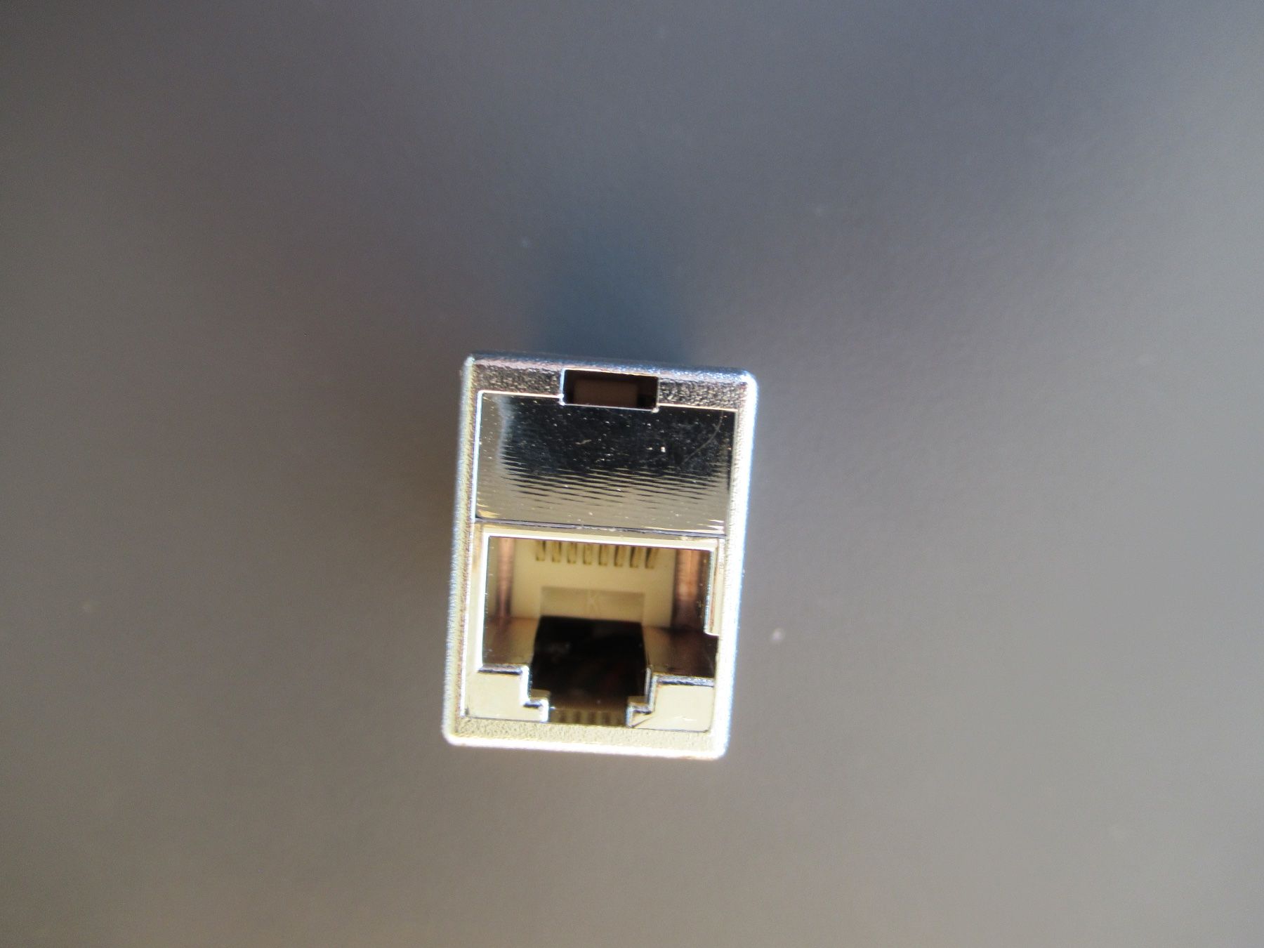 Laufwerke & Adapter: RJ45 Modularkupplung, Gender Changer – Neu und originalverpackt aus Obergösgen von cairn 1