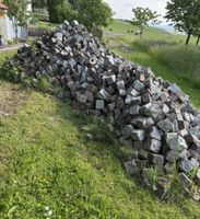 Pflastersteine graue und rote Steine