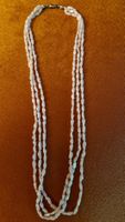 Elegante dreireihige Perlenkette - Zeitloser Schmuck!