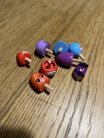 Lot de 7 mini toupies en bois Migros avec visages + support
