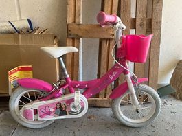 Vélo rose 12 pouces à vendre