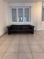Two Seater Leather Sofa in Black, Used Condition