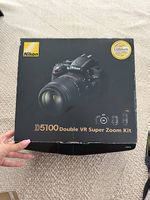 Nikon D5100 + 18-55mm VR + 55-300mm VR