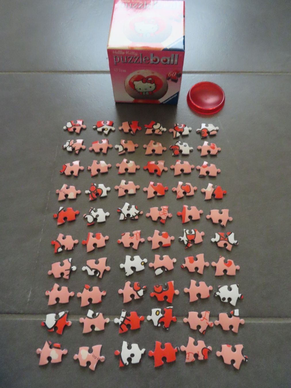 Ravensburger Puzzle: HELLO KITTY Puzzleball 60 Teile – Usato da Wallenried venduto da Asyano 1