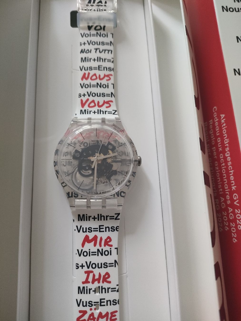 Swatch Orologi: Swatch Aktionärsuhr 2026 – Nuovo e nell'imballaggio originale da Bern venduto da Lidia.5 1