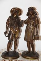Paire de sculptures en bronze antique .