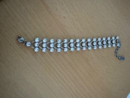 Bracelet vintage articulé en métal argenté et strass