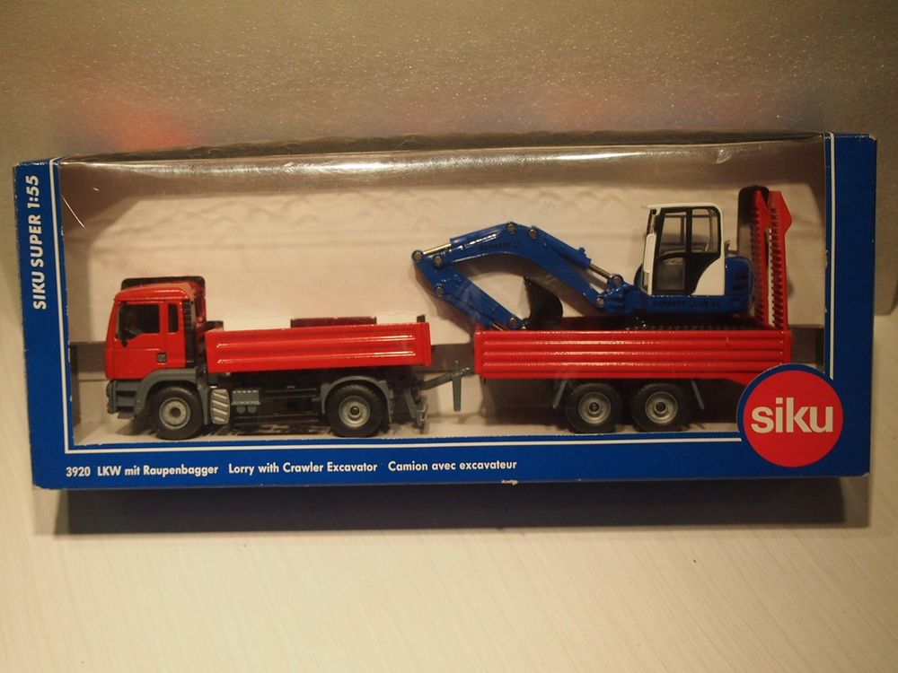 MAN Pritschenwagen mit Anhänger und Bagger - Siku | Kaufen auf Ricardo