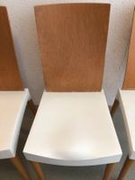 4 Esszimmer-Designerstühle