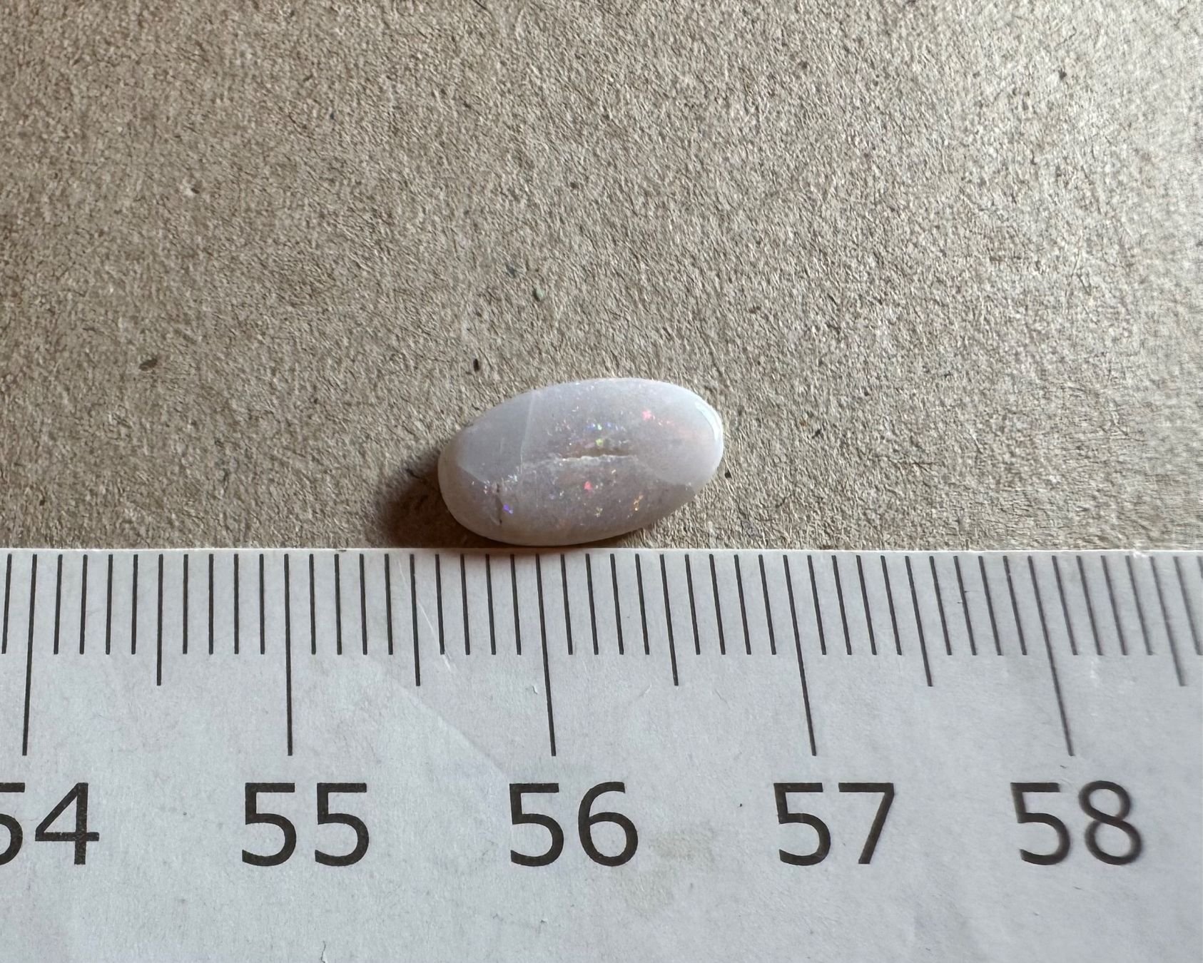 Fossili: winziger OPAL,   geschliffen poliert  12mm – Nuovo e nell'imballaggio originale da Leuggern venduto da gemshow