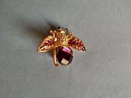 Brosche Biene goldfarben mit lila Stein guter Zustand