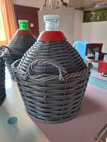 Korbflaschen mit Plastikschutz