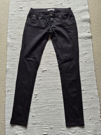 schwarze Skinny Jeans