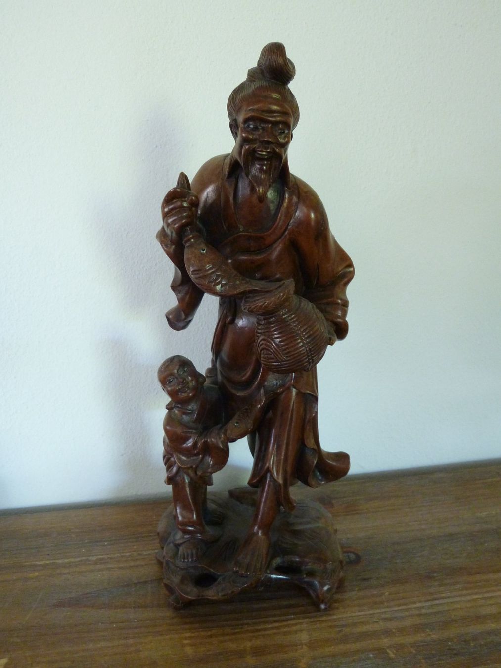 Sculptures & Statues: geschnitzte Holzfigur Mann mit Kind  chinesische Kunst – D'occasion à Dättlikon par Mamakuga