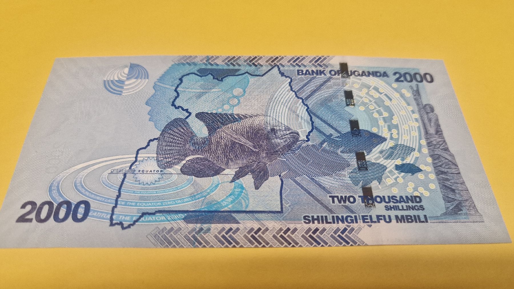 Banconote: Uganda Banknote: 2000 Schilling, Jahr 2010, – Nuovo e nell'imballaggio originale da Herisau venduto da Antiques.AR 1
