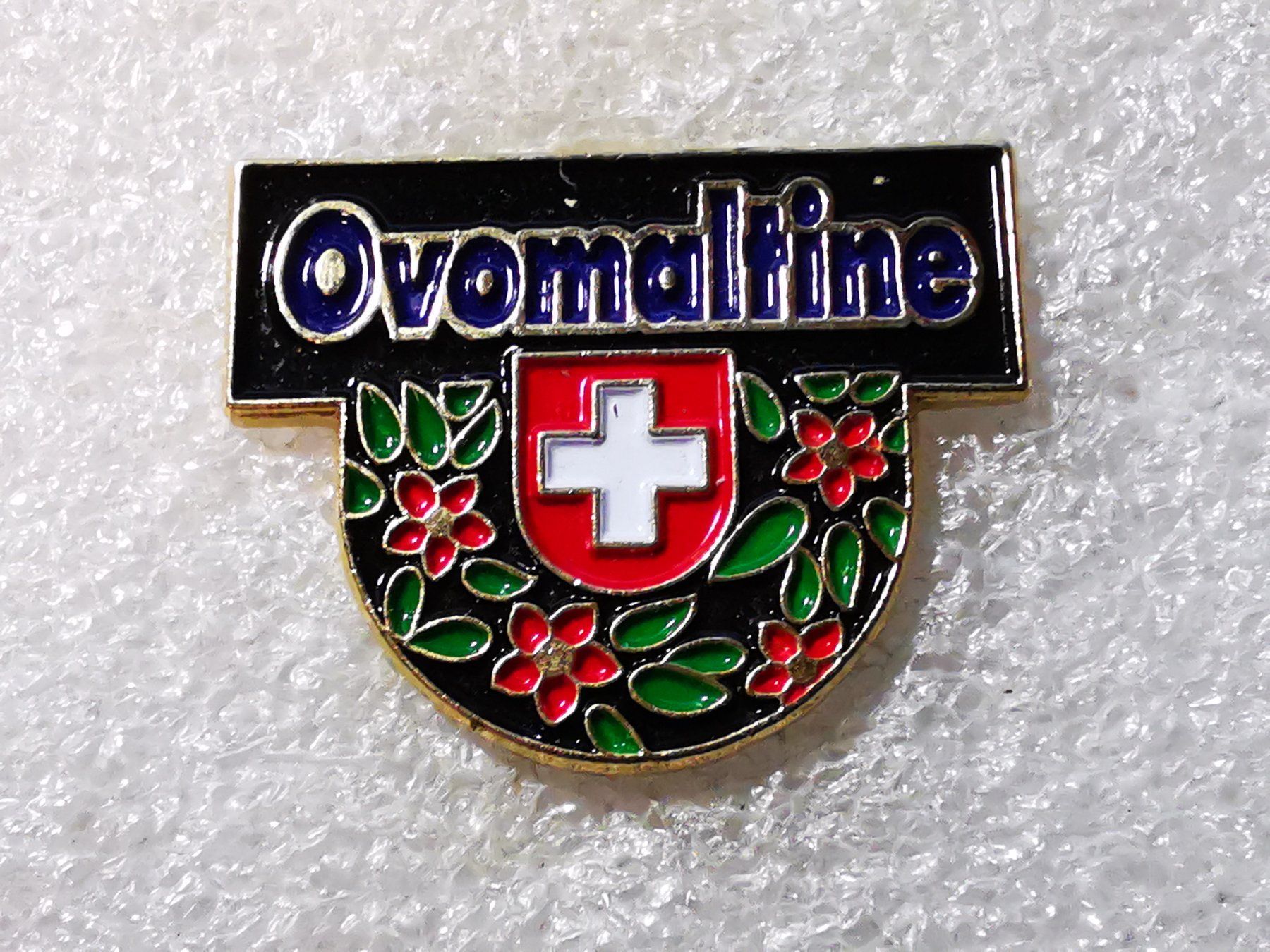 Placchette & Badge: Ansteckpin 49: Ovomaltine – Usato da Oppligen venduto da Pin-Fall-Shop