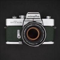 Minolta SRT303b Spiegelreflexkamera mit 3 Objektiven.