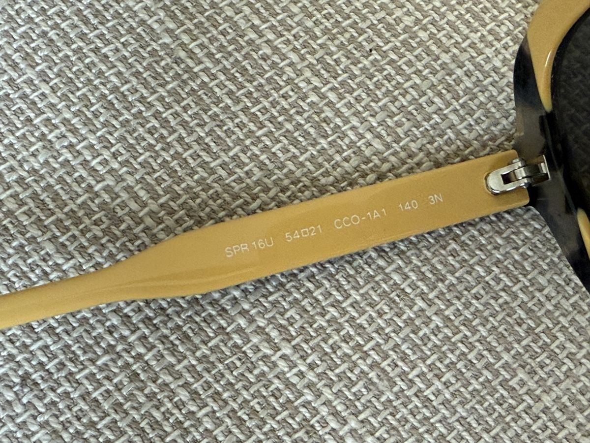 Prada Occhiali & Lenti: Lunettes de soleil noir/jaune/marron Prada – Usato da Tavannes venduto da Thriftshop 2