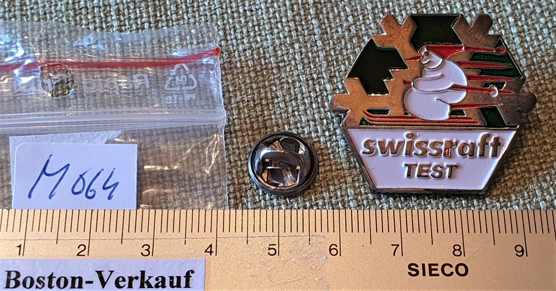 Placchette & Badge: M064 - Pin Swissraft Test Ski Schneemann – Usato da Reinach BL venduto da Boston-Verkauf 1