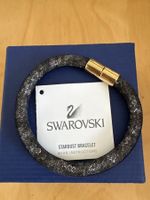 Bracciale Swarovski Stardust nero con chiusura oro