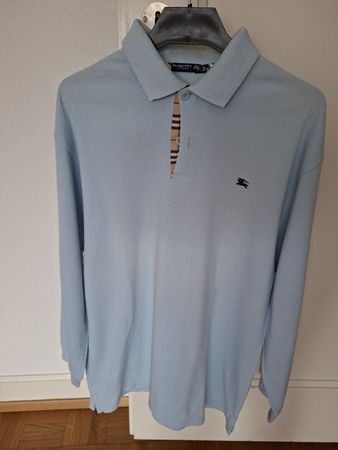 Polo manches longues bleu clair taille M