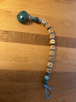 Nuggikette mit Holzperlen blau Nuggipirat gebraucht