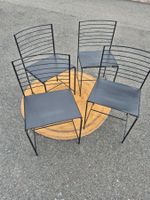4 chaises noires années 1970 CIDUE ITALY ALICE