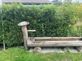 Traditionell Holzbrunne