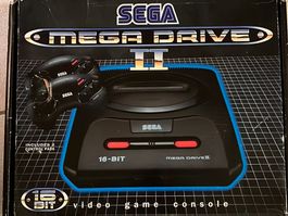Sega Mega Drive II mit Spielen